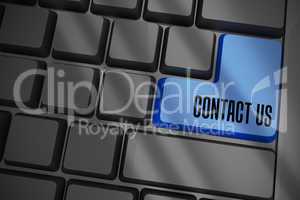Contact us on black keyboard with blue key