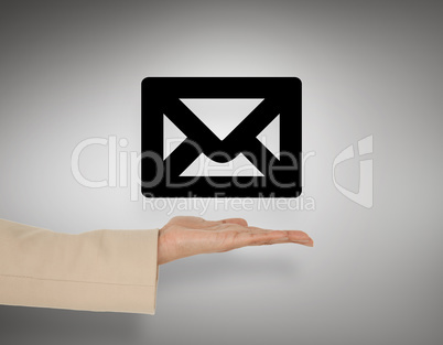 Composite image of female hand presenting envelope Composite image of female hand presenting envelope