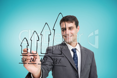 Composite image of businessman drawing graph