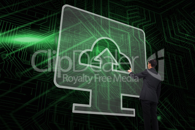 Composite image of computer screen and businessman pointing