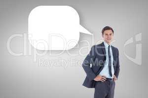 Composite image of smiling businessman with speech bubble with h