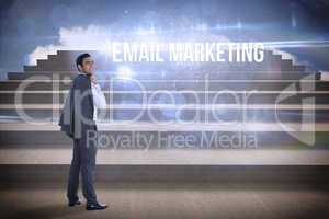 Email marketing against steps against blue sky