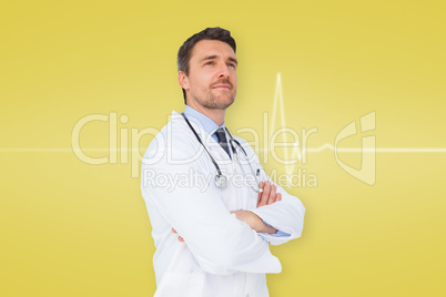 Composite image of handsome young doctor with arms crossed