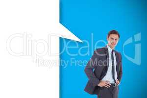 Composite image of smiling businessman with speech bubble