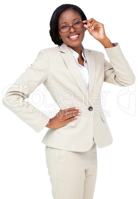 Thinking businesswoman in cream suit