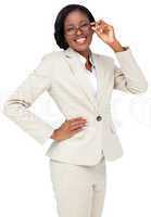 Thinking businesswoman in cream suit