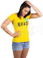 Upset football fan in brasil tshirt