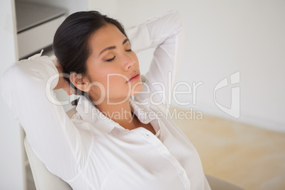 Casual businesswoman napping at her desk Casual businesswoman napping at her desk