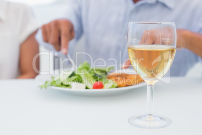 Glass of white wine on a table