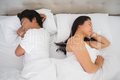 Couple sleeping in bed