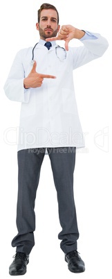 Handsome young doctor gesturing with hands