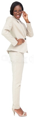 Thinking businesswoman in cream suit