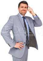 Thinking businessman in grey suit