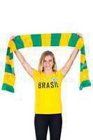 Excited football fan in brasil tshirt