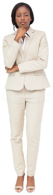 Thinking businesswoman in cream suit