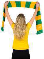 Excited football fan in brasil tshirt