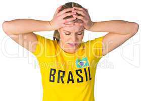 Disappointed football fan in brasil tshirt