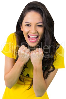 Excited football fan in brasil tshirt