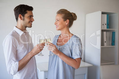 Casual business team toasting with champagne