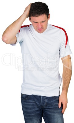 Disappointed football fan in white