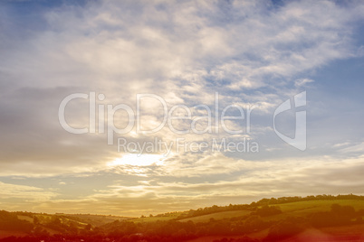 Scenic landscape with blue cloudy sky