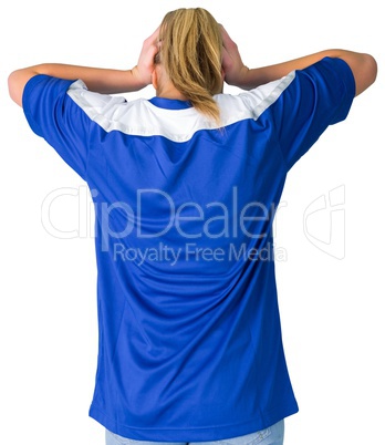 Disappointed football fan in blue