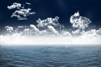 Cloudy sky and blue ocean