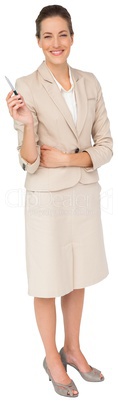 Thinking businesswoman in cream suit