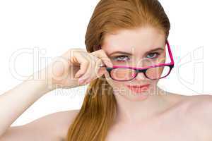 Beautiful redhead posing with glasses