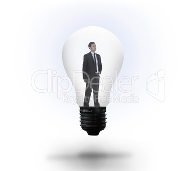 Thinking businessman in light bulb