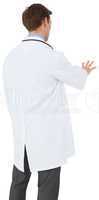 Young doctor in lab coat gesturing