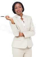 Thinking businesswoman in cream suit