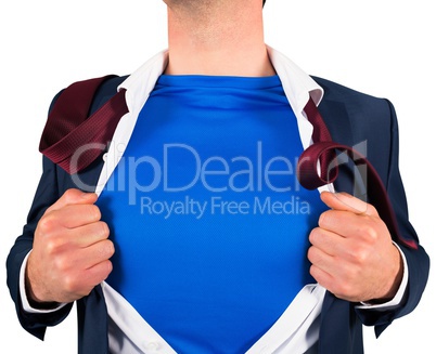 Businessman opening his shirt superhero style