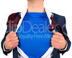 Businessman opening his shirt superhero style