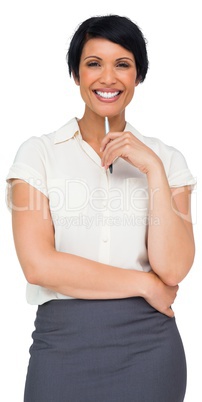 Thoughtful brown haired businesswoman in skirt