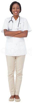 Young nurse in tunic with arms crossed