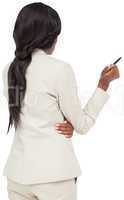 Thinking businesswoman in cream suit