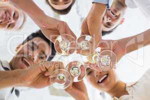 Casual business team toasting with champagne