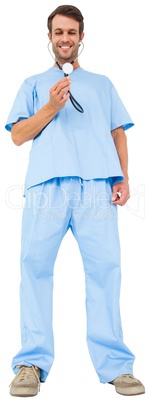 Handsome surgeon in blue scrubs using stethoscope