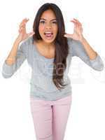 Angry casual young brunette shouting