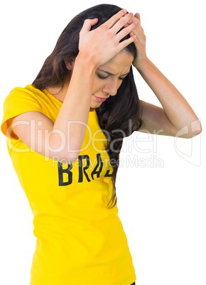 Disappointed football fan in brasil tshirt