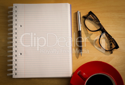 Overhead of notepad and pen