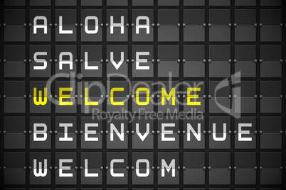 Welcome in languages on black mechanical board