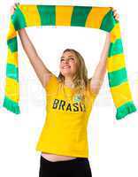 Excited football fan in brasil tshirt