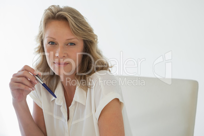 Casual businesswoman smiling at camera