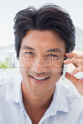 Smiling man on phone call