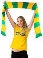 Excited football fan in brasil tshirt