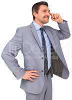 Thinking businessman in grey suit