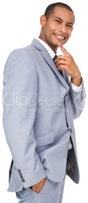 Thinking young businessman in blue suit