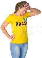 Upset football fan in brasil tshirt